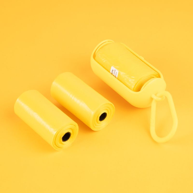 Bolsa-Para-Desechos-De-Mascotas-Con-Dispensador-MINISO-Port-til-Amarillas-3-Piezas-4-24831